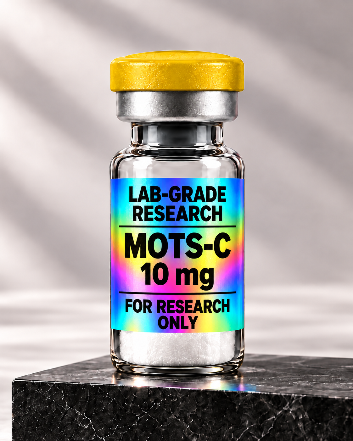 Illustrative MOTS-C 10 mg vial with bold printed Lab-Grade Research holographic label and yellow cap on a black marble base